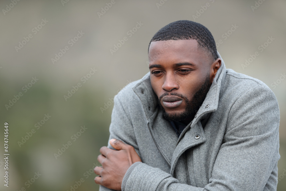 Ταπετσαρία Man with black skin getting cold outdoors in winter