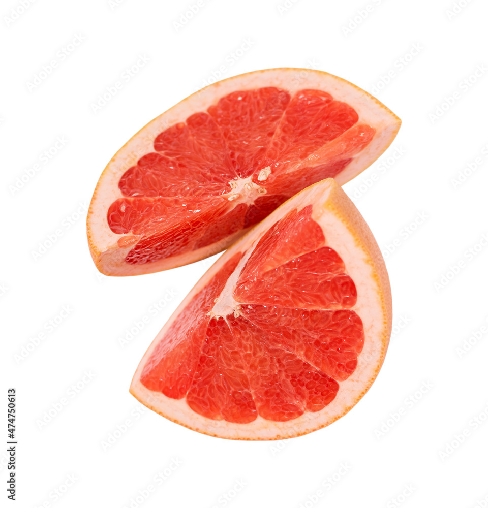 Grapefruit two slices close-up isolated on a white background. Grapefruit two slices close-up isolated on a white background.