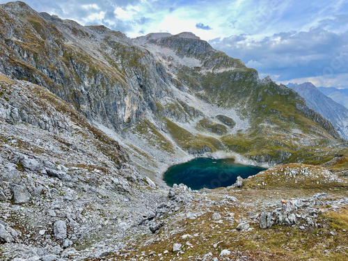 Mountain lake in the Swiss Alps, Lower Engadine, Grisons. photo