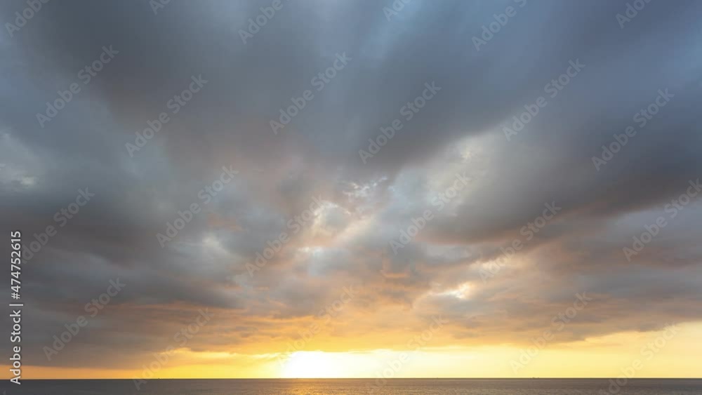 timelapse Scene of romantic sky sunset with cloud moving in the sky background . .beautiful golden sky at sunset above island in nature and travel concept.sunset landscape Amazing light of cloudscape timelapse Scene of romantic sky sunset with cloud moving in the sky background . .beautiful golden sky at sunset above island in nature and travel concept.sunset landscape Amazing light of cloudscape