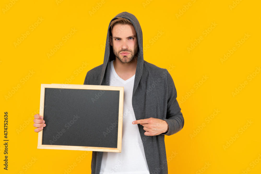 man presenting advertisement with copy space on yellow background, advertisement man presenting advertisement with copy space on yellow background, advertisement