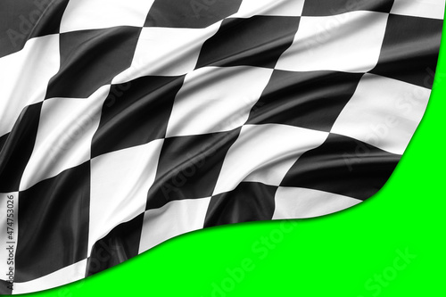 Checkered flag on green © Stillfx