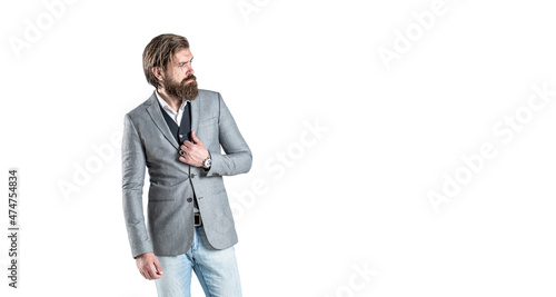 Man in suit. Male beard and mustache. Sexy male, brutal macho, hipster. Hand in with wrist watch in a business suit. Elegant handsome man in suit. Handsome bearded businessman in classic suits