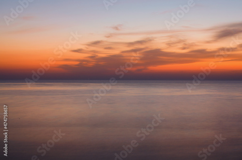 Abstract landscape view of Mediterranean Sea before sunrise. Blurred motion. Sunrise over a beach. Long exposure. Turkey