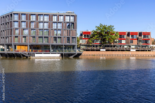 Modern apartment buildings on the bank of the river Odra on the island Kepa Mieszczanska, Wroclaw, Poland