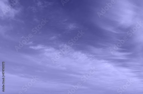 Фотография Abstract template with blue sky, white clouds and waxing half moon toned in trendy color of year 2022