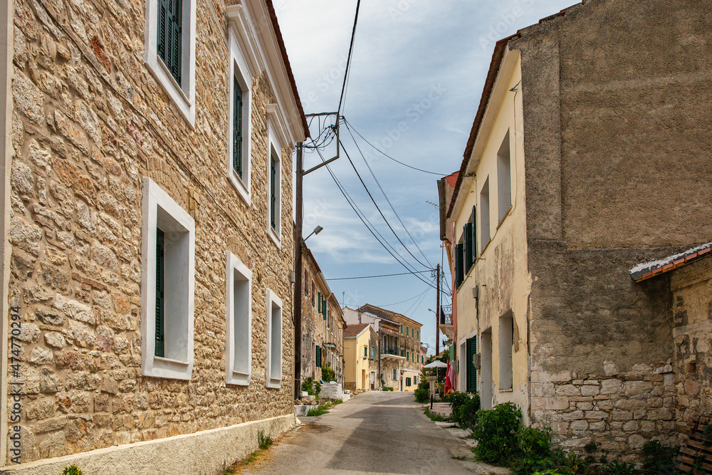 Old narrow street in Lefkimmi, Corfu, Greece.