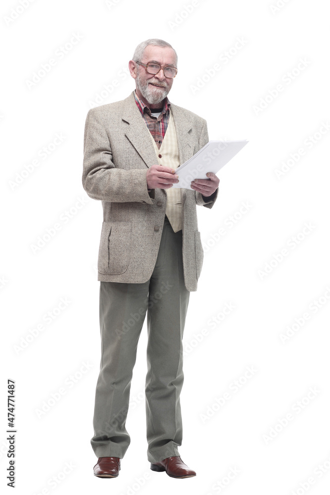 smiling elderly man reading a business document. smiling elderly man reading a business document.