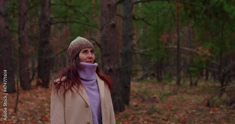 Portrait, a young woman takes a deep breath, she stands in a pine forest and smiles. Beautiful woman enjoys clean fresh air, healthy people. 4k, ProRes Portrait, a young woman takes a deep breath, she stands in a pine forest and smiles. Beautiful woman enjoys clean fresh air, healthy people. 4k, ProRes