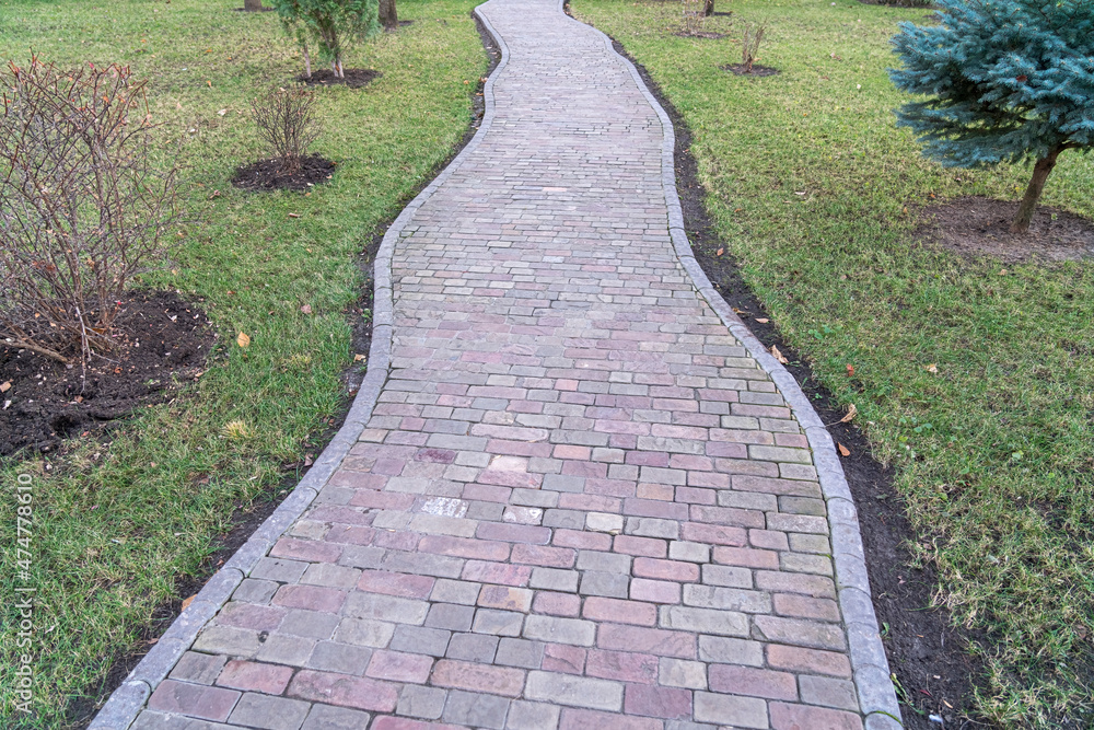 a stone path among the grass leading to nowhere a stone path among the grass leading to nowhere