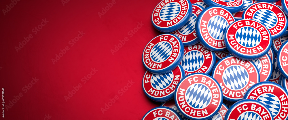 Richtlijnen wenselijk Gedwongen Logos of the German Soccer Club FC Bayern Munich on a heap on a table. Copy  space. Web banner format Stock Photo | Adobe Stock