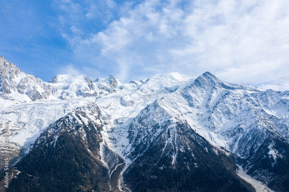 The imposing Mont Blanc massif in Europe, France, the Alps, towards Chamonix, in spring, on a sunny day.
