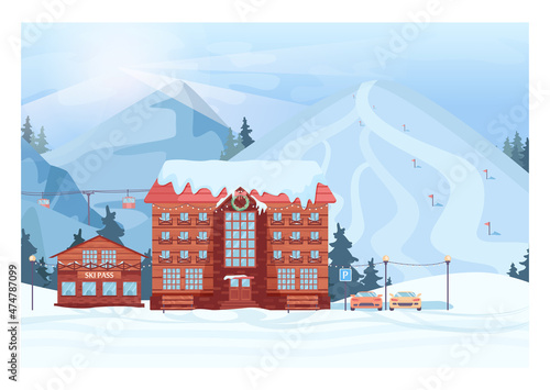 Skiing resort landscape. Winter vilage with a hotel and ski tracks