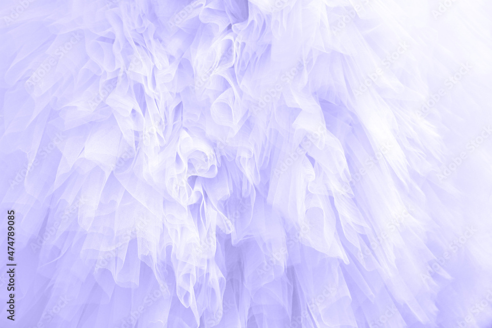 Fototapeta premium Trendy Color of Year 2022. Violet texture of a wavy surface of a chiffon fabric