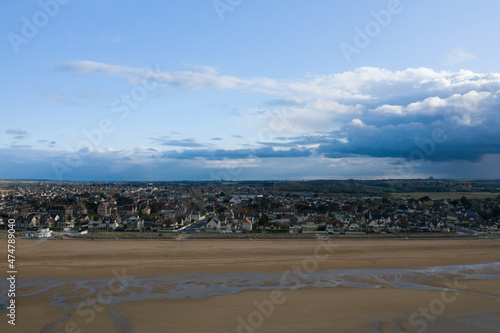 The city of Ouistreham and its beach in Europe, France, Normandy, in summer, on a sunny day.