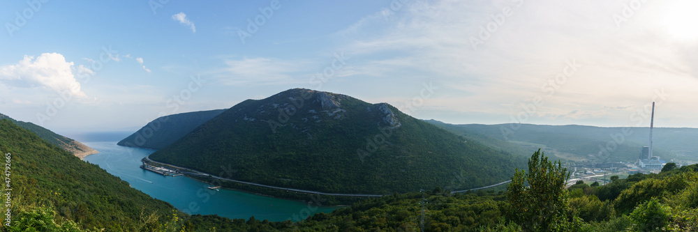 Panorama of river Boljuncica flowing into sea bay with power plant, Plomin, Istria, Croatia, Europe