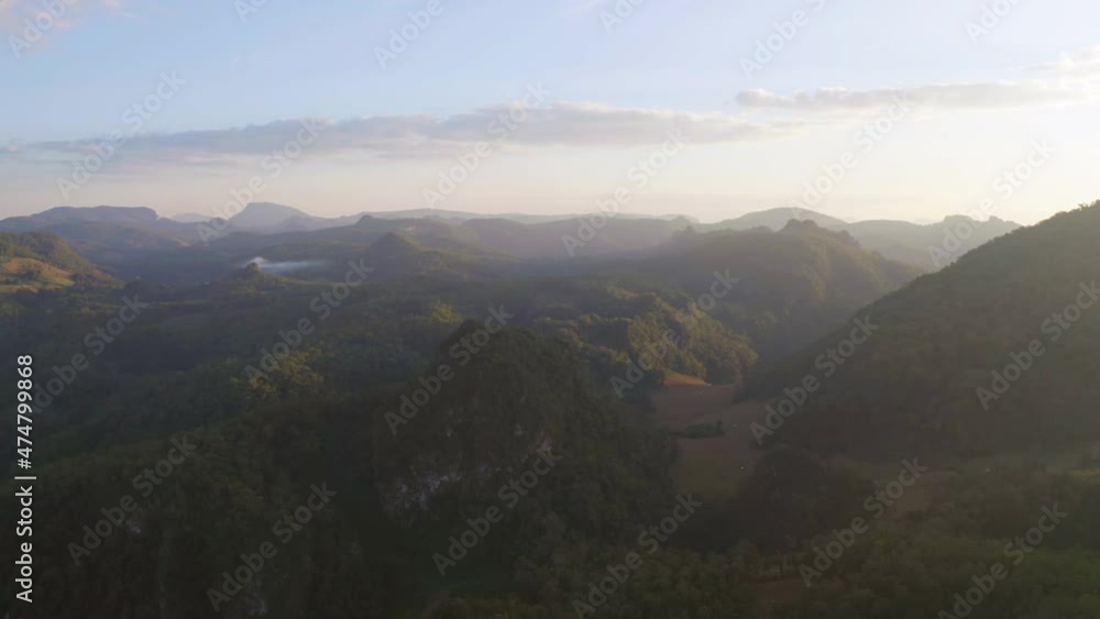 Aerial top view of forest trees and green mountain hills. Nature landscape background, Thailand. Aerial top view of forest trees and green mountain hills. Nature landscape background, Thailand.