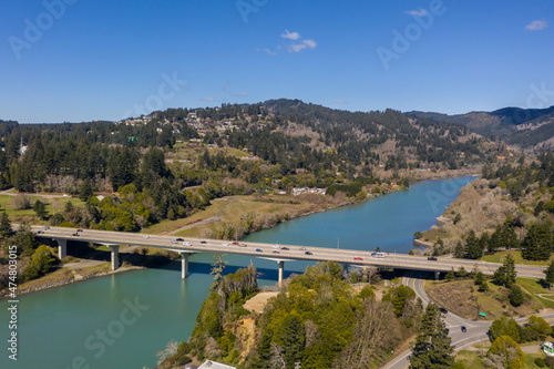 Aerial of bridge over Chetco River in Brookings, Oregon.