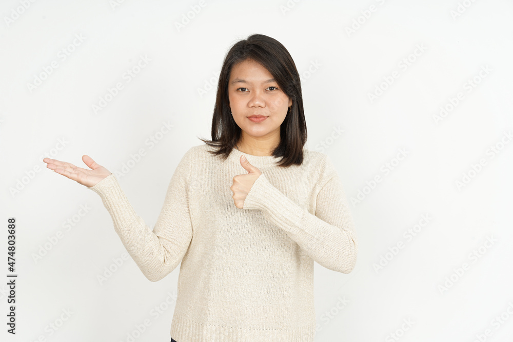 Showing recommended product on open palm of Beautiful Asian Woman Isolated On White Background Showing recommended product on open palm of Beautiful Asian Woman Isolated On White Background