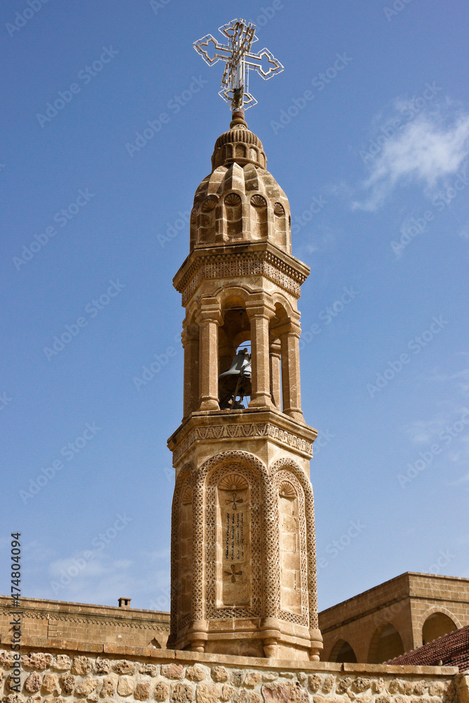 The carved stone bell tower of Deyrulumur Monastery near Midyat, Eastern Anatolia, Turkey