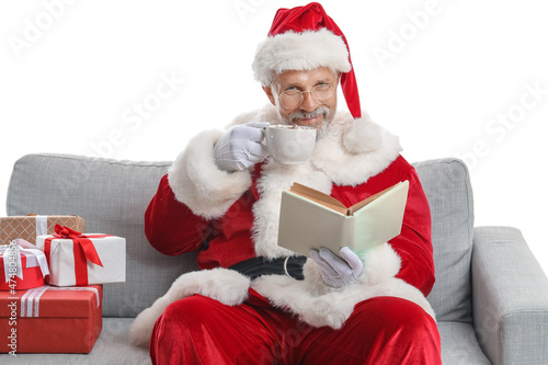 Santa Claus sitting on sofa...