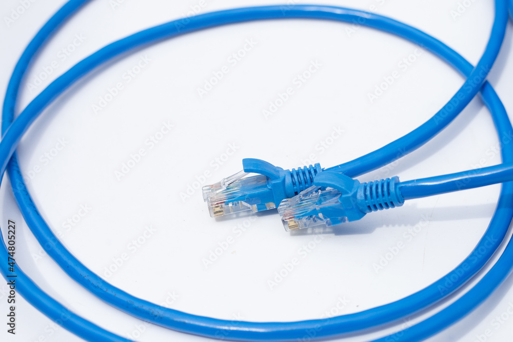 LAN network connection ethernet blue cables on white background. LAN network connection ethernet blue cables on white background.