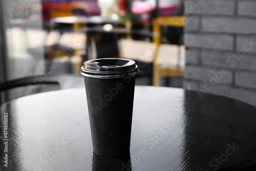 Takeaway cup of tasty latte...
