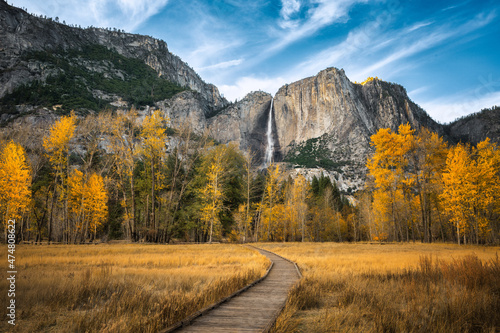 yosemite falls during autumn with blue clouds