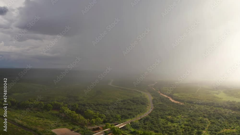 Dramatic monsoon rain, cars drive on Arizona highway Dramatic monsoon rain, cars drive on Arizona highway