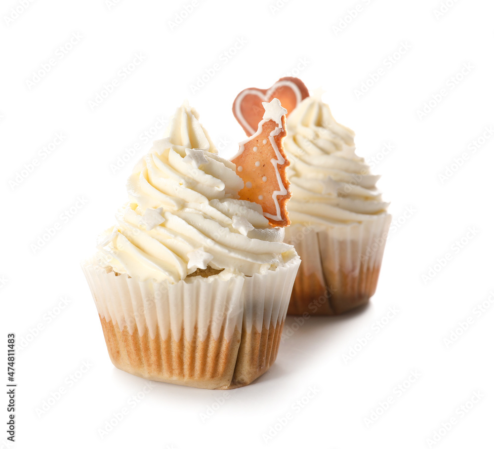 Delicious Christmas cupcakes on white background Delicious Christmas cupcakes on white background