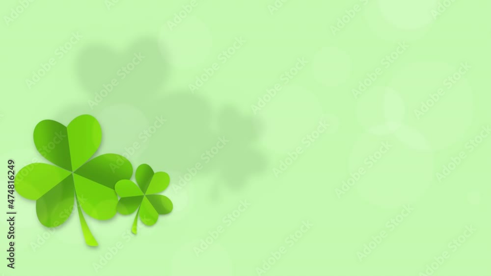 Big green Saint Patrick shamrocks and round bokeh, national Ireland holidays style background Big green Saint Patrick shamrocks and round bokeh, national Ireland holidays style background
