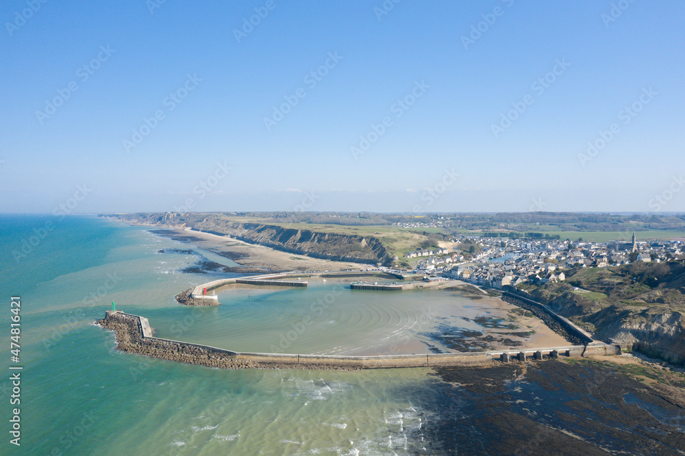 The port and town of Port en Bessin on the English Channel in Europe, France, Normandy, towards Omaha beach, in spring, on a sunny day.