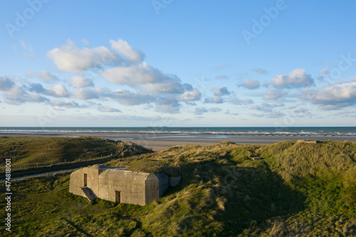 The blockhouse of the breach facing the beach of Utah Beach in Europe, France, Normandy, towards Carentan, in spring, on a sunny day.
