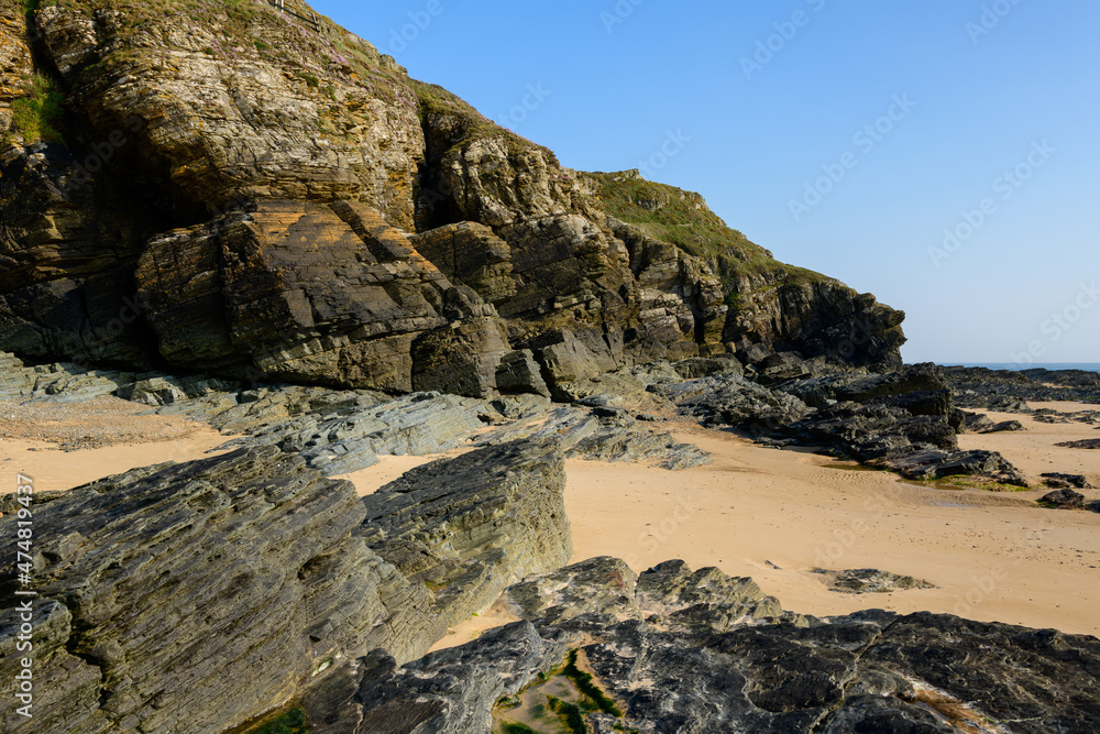 The huge rocks and caves of Cap de Carteret in Europe, France, Normandy, Manche, in spring, on a sunny day.