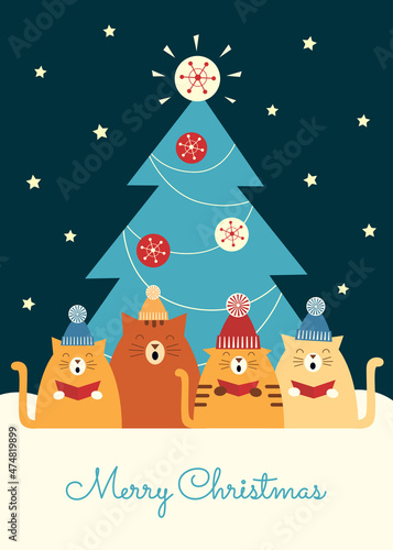 Vector colorful retro styled illustration of four cats in knitted hats singing carols under a big Christmas tree. Greeting text “Merry Christmas”. Vertical format. Dark background.