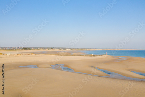 The fine sandy beach of La Potiniere in Europe, France, Normandy, Manche, in spring, on a sunny day.