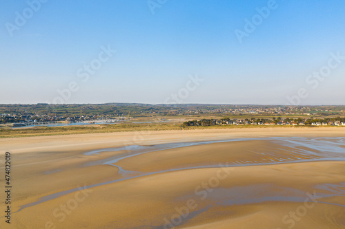 The large fine sandy beach of Barneville in Europe, France, Normandy, Manche, in spring, on a sunny day.