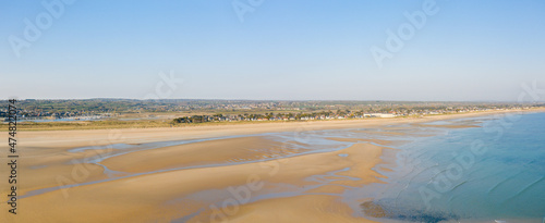 The panoramic view of the Grande Plage de Barneville in Europe, France, Normandy, Manche, in spring, on a sunny day.