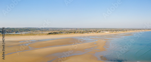 The panoramic view of the Grande Plage de Barneville in Europe, France, Normandy, Manche, in spring, on a sunny day. photo