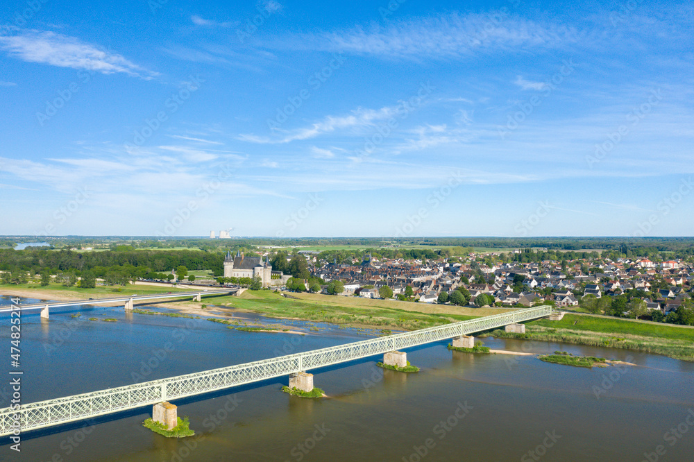 The bridges over the Loire of the city of Sully sur Loire in Europe, in France, in the Center region, in the Loiret, in summer, on a sunny day.