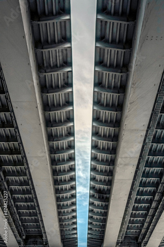 View of the bridge from below. Symmetry in the engineering structure of the bridge