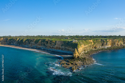 Pointe du Hoc seen from the Channel Sea in Europe, France, Normandy, towards Carentan, in spring, on a sunny day.