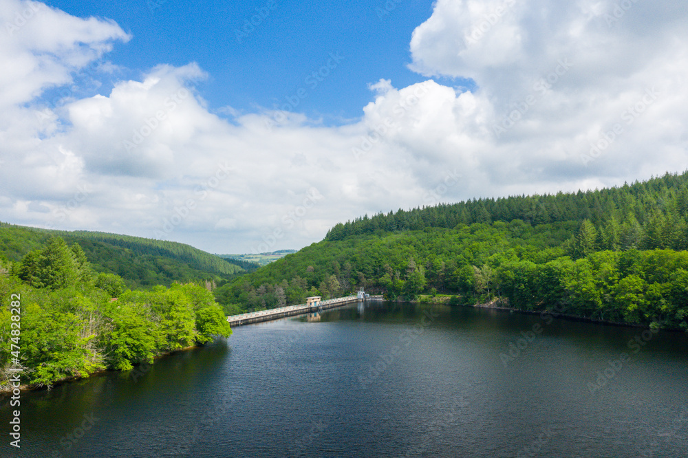 Fototapeta premium The Lac de Chaumecon dam in the middle of forests in Europe, France, Burgundy, Nievre, Morvan, in summer, on a sunny day.