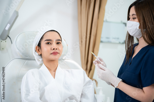 young Asian woman making cosmetology treatment skin injection, Mesotherapy of face beauty care