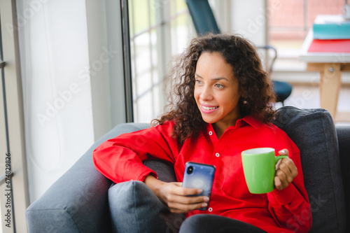 African American woman drin...
