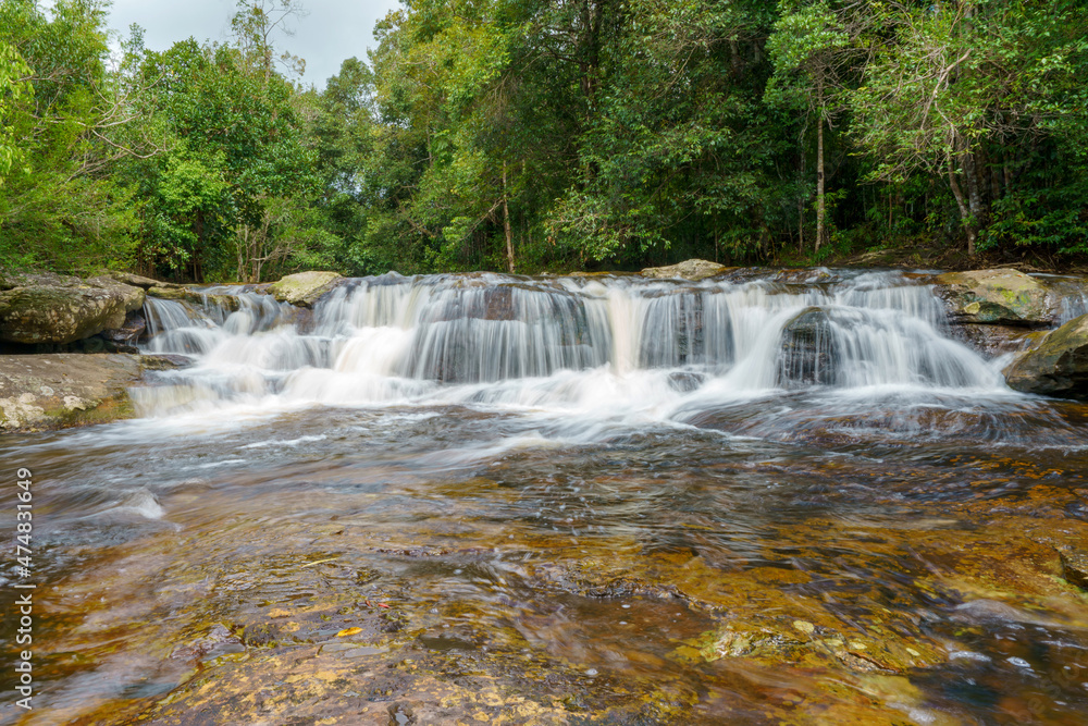 Obraz premium Waterfall at Phu Kradueng national park, Loei Thailand, beautiful landscape of waterfalls in rainforest