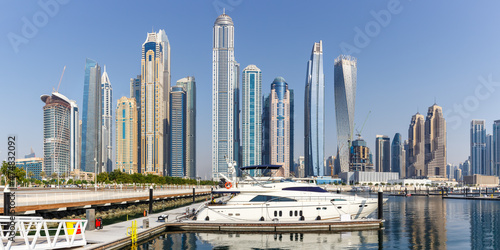 Dubai Marina and Harbour skyline architecture wealth luxury travel in United Arab Emirates with boat yacht panorama © Markus Mainka