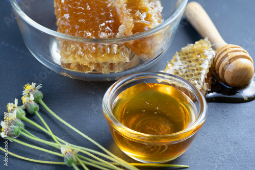 Sweet Honeycomb in wooden plate on wooden background, Natural honey with honeycomb