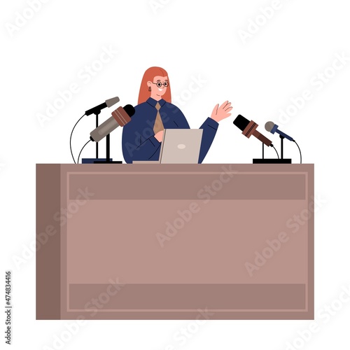 Woman sit at the tribune with laptop speaking to microphones. Speaker at the Forum, conference about Gender Equality.