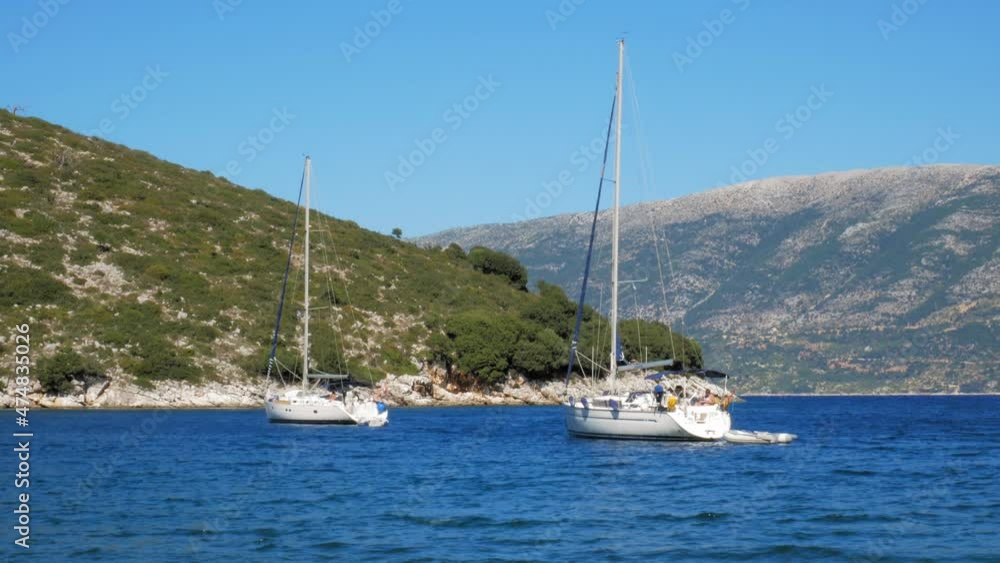 Sailing Boats near Agia Eleni Beach on Skiathos Island - wide shot Sailing Boats near Agia Eleni Beach on Skiathos Island - wide shot